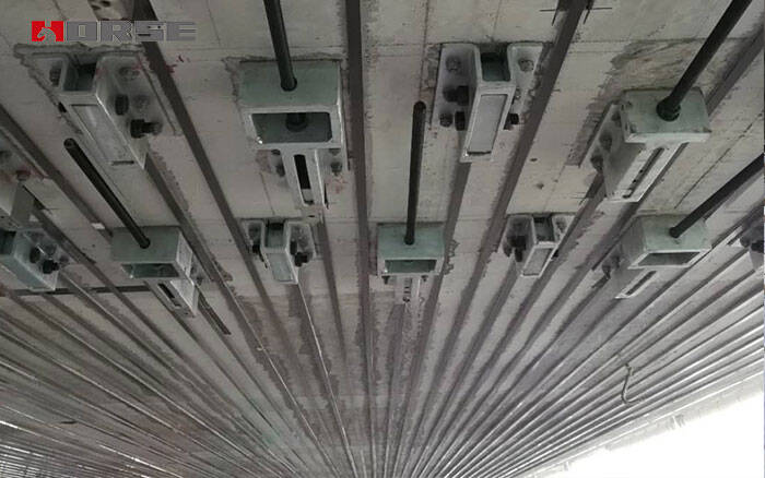 RC beams strengthened with prestressed FRP plates