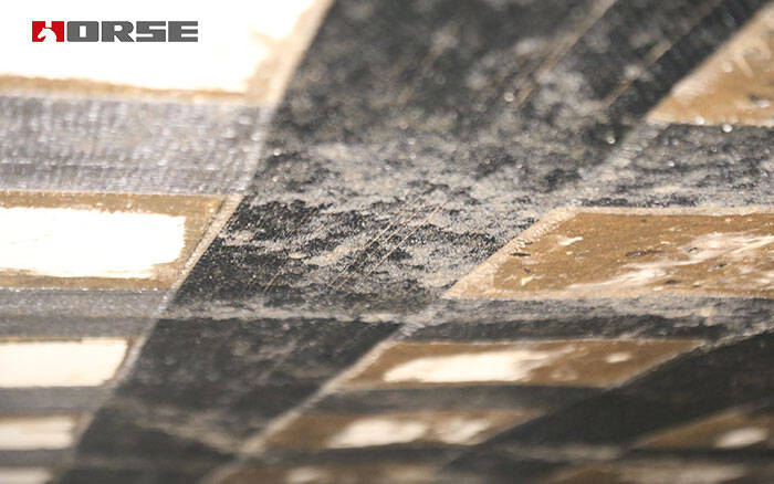 Externally bonded carbon fiber fabric on concrete structure