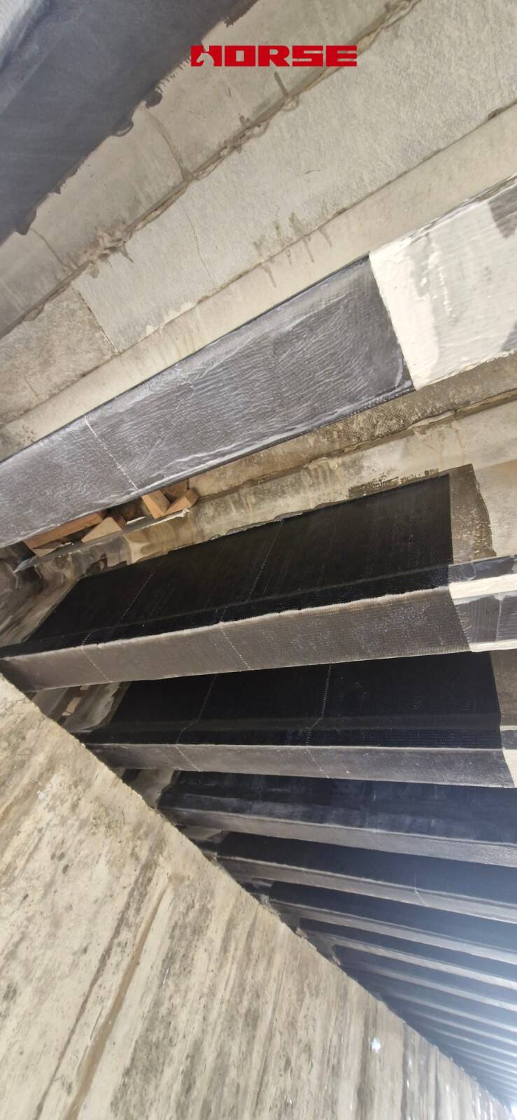 Refuerzo de Puente Multiviga de Hormigón Pretensado con Laminado de CFRP y U-wrap