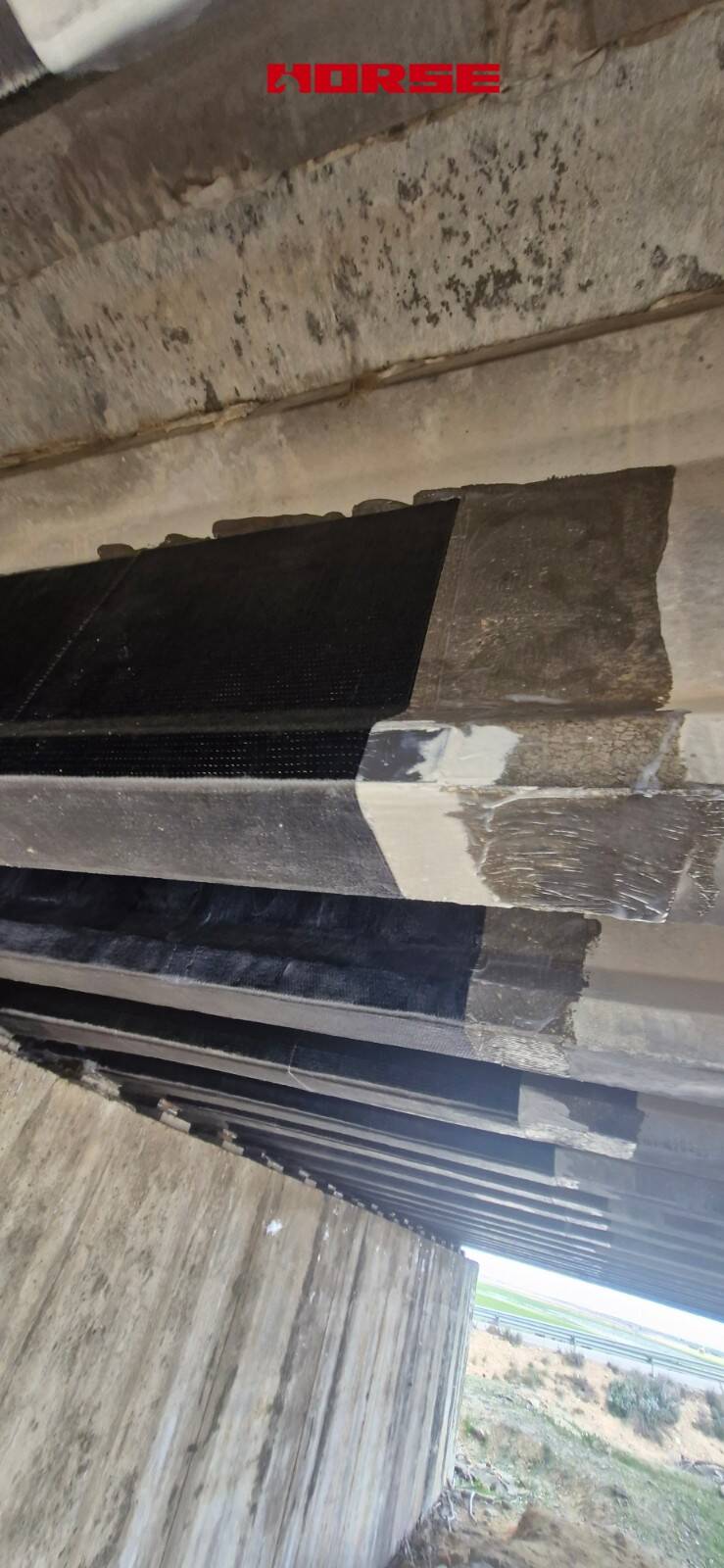 Refuerzo de Puente Multiviga de Hormigón Pretensado con Laminado de CFRP y U-wrap