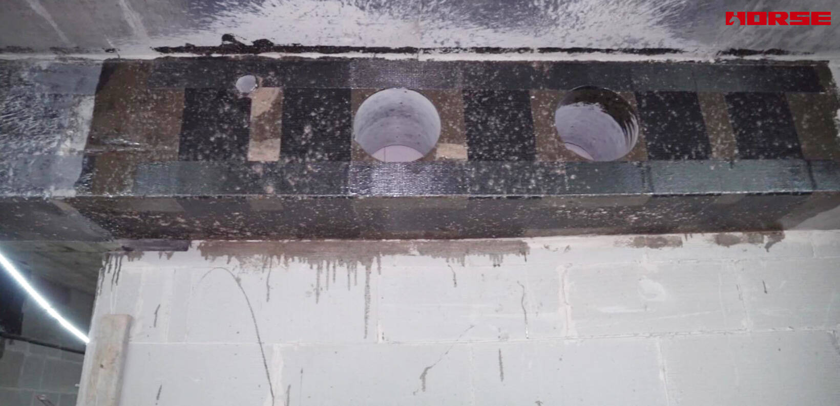 Refuerzo de Aberturas en Vigas de Hormigón Armado con Láminas de Fibra de Carbono
