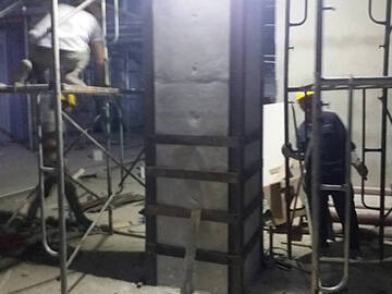 Refuerzo del centro comercial Nanjing Xinbai: CFRP, placa de acero adherida, anclaje