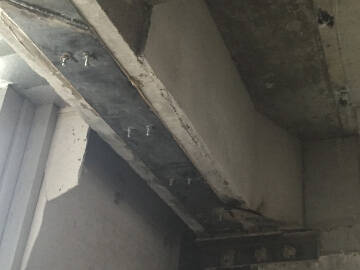 pegado de placa de acero sobre hormigón