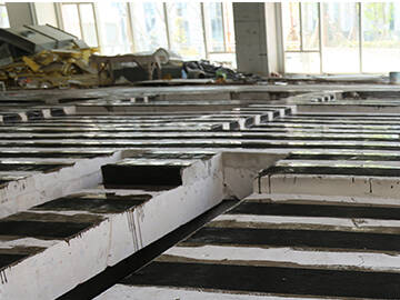 Refuerzo de aberturas mediante sistemas poliméricos reforzados con fibra de carbono