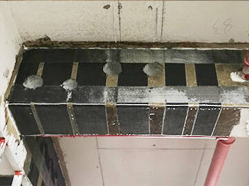 Aplicación del aumento de carga mediante envoltura de FRP