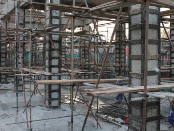 Epoxy bonded steel plate for the column of the holtel