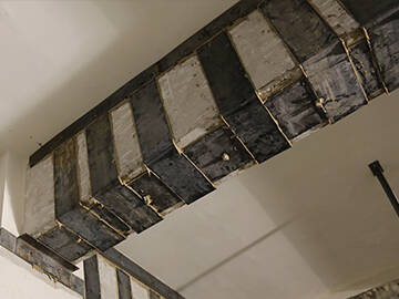 Reparación de hormigón agrietado con placa de acero