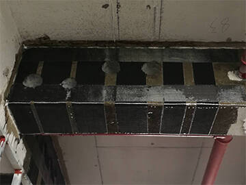 Refuerzo de vigas de hormigón mediante sistema de refuerzo compuesto de CFRP