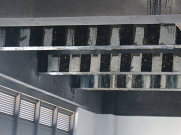 Rehabilitación de una antigua fábrica industrial con tejido de polímero reforzado con fibra (FRP)