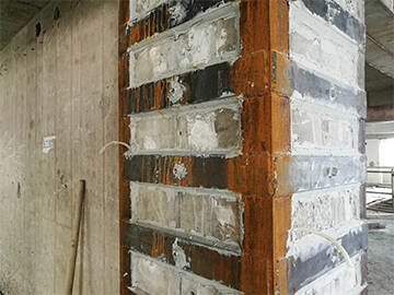 Placa de acero unida con epoxi para refuerzo de edificios después de un incendio