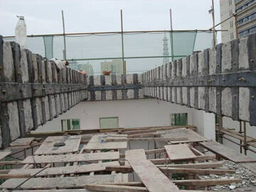 Aplicación del método de encolado de placas de acero al refuerzo de puentes