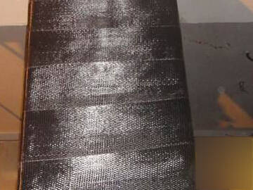 Envoltura de fibra de carbono para reforzar columnas