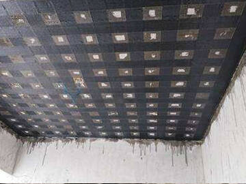 Ingeniería de refuerzo de grietas en losas de hormigón armado con revestimiento de FRP