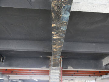 Refuerzo de vigas de hormigón armado mediante envoltura de FRP