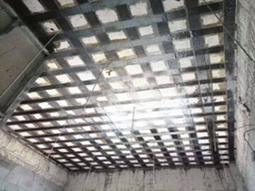 Refuerzo de tejido de fibra de carbono para losas de piso agrietadas