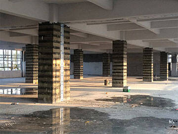 Envoltura de fibra de carbono para columnas de hormigón armado