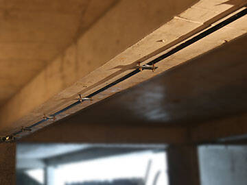 Vigas de hormigón armado reforzadas con laminado de CFRP y láminas de CFRP