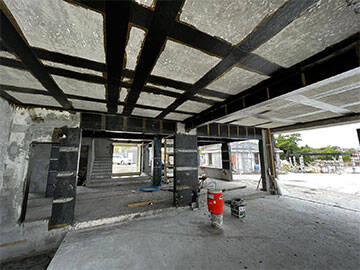 Villa de erosión de la brisa marina y refuerzo por fibra de carbono