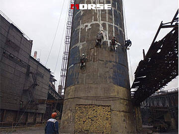 Chimeneas Reforzadas con Fibra de Carbono con Grietas y Barras de Refuerzo Expuestas